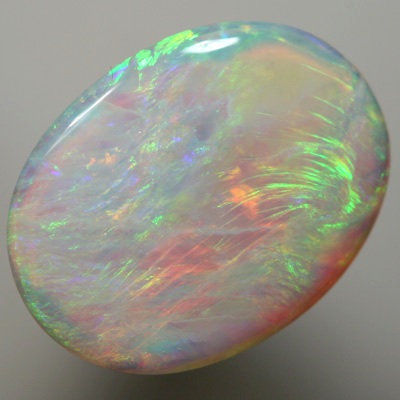 SOLID SEMI BLACK OPAL Orange moves with green with a touch of purple between these colours